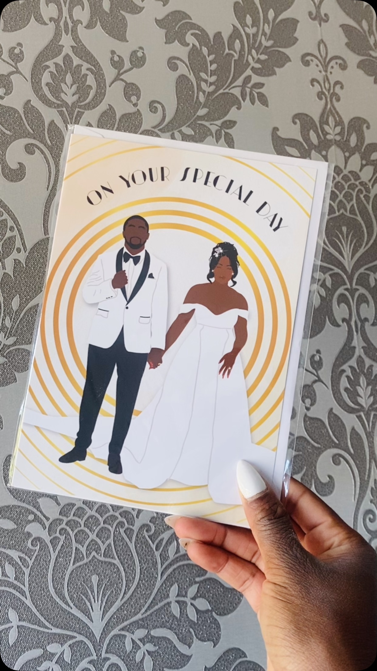 💍✨ Wedding season is still in full swing! ✨💍

Celebrate love with a card that reflects the beautiful newlyweds in your life. 🤎

Our Black Newlyweds wedding card is the perfect way to congratulate the happy couple while celebrating representation and love. Whether you’re attending a wedding this summer or sending your well wishes from afar, make your message even more meaningful.

Shop now and make every celebration count. 💒💐
#Beautifulroots #embracingculturethroughart 
#WeddingSeason #BlackLove #RepresentationMatters